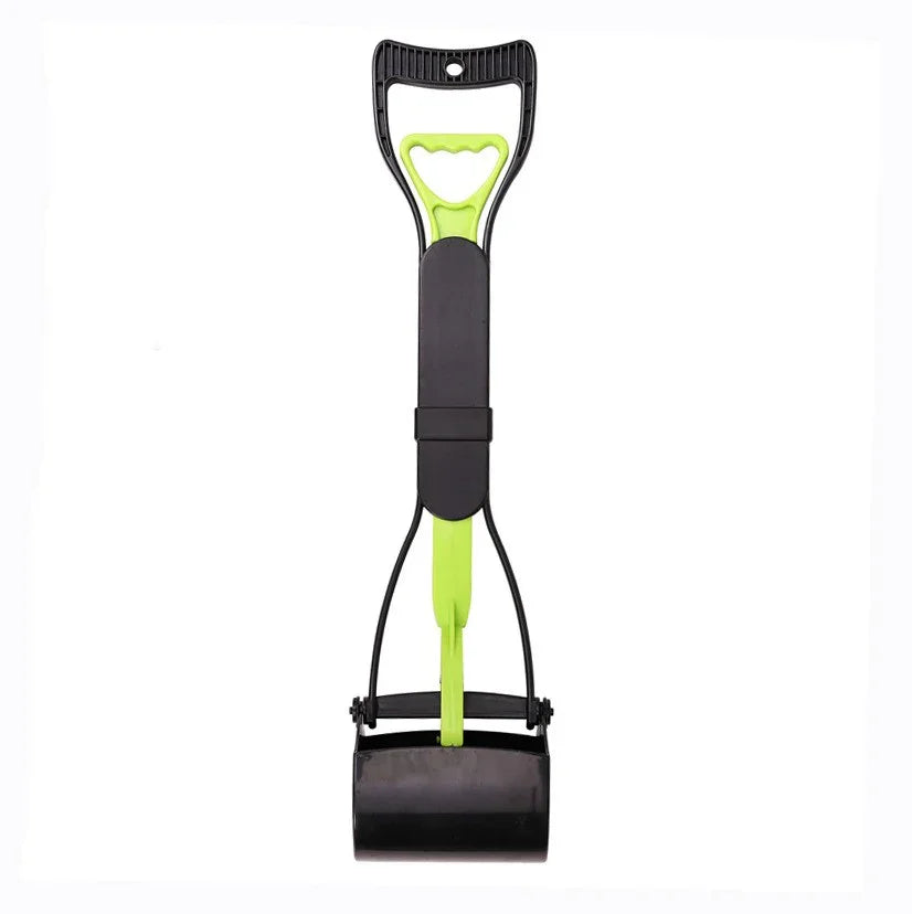 Garden dog pooper scooper with black handle and green head 