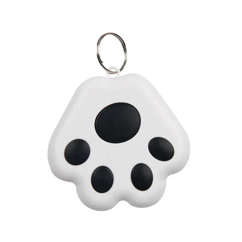 White paw-shaped keychain tracker with black spots 