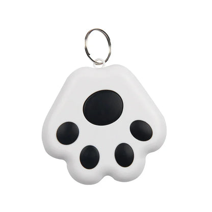 White paw-shaped keychain tracker with black spots 